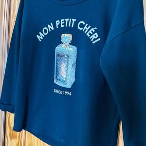 Divided "Mon Petit Chéri" Sequin Perfume Bottle Sweatshirt